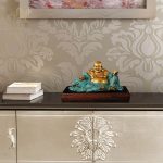 Tượng phật di lặc ngồi cầm hũ tiền CD879Tượng phật di lặc ngồi cầm hũ tiền CD879