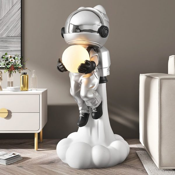 Tượng decor mẫu phi hành gia cầm bóng cưỡi tên lửa để sàn