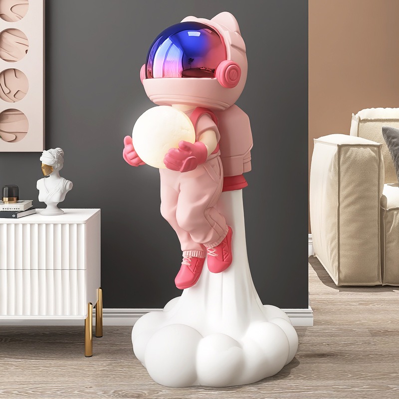 Tượng decor mẫu phi hành gia cầm bóng cưỡi tên lửa để sàn