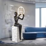 Tượng decor nghệ thuật điêu khắc cầm đèn