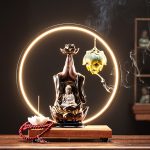 Thác khói trầm hương tay Phật