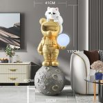 Tượng chú bé phi hành gia trên mặt trăng CD1447