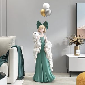 Tượng cô gái cầm bóng