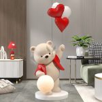 Tượng gấu tâng bóng