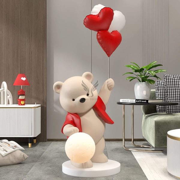 Tượng gấu tâng bóng