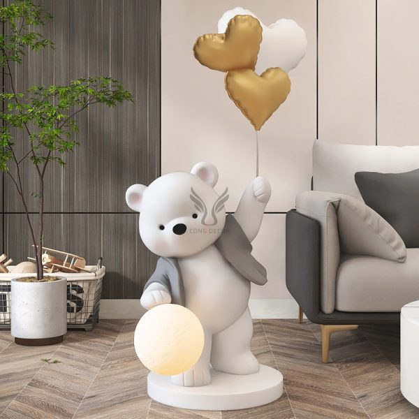Tượng gấu tâng bóng