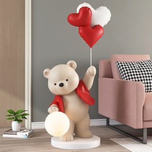 Tượng gấu tâng bóng