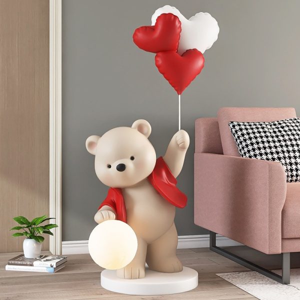 Tượng gấu tâng bóng